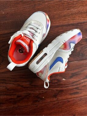 Kids White Sneakers with Blue Swoosh and Orange Lining